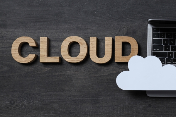whitepapercloudwithlaptoponblacktablebackg20231221222754utc.jpg