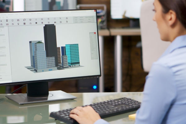 youngfemalearchitectworkingoncomputerwith3d20231127053354utc.jpg