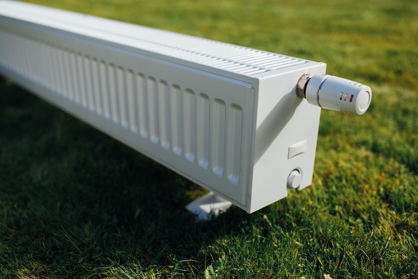 100133340radiatorongreenlawnecologicalheatingconcept.jpg