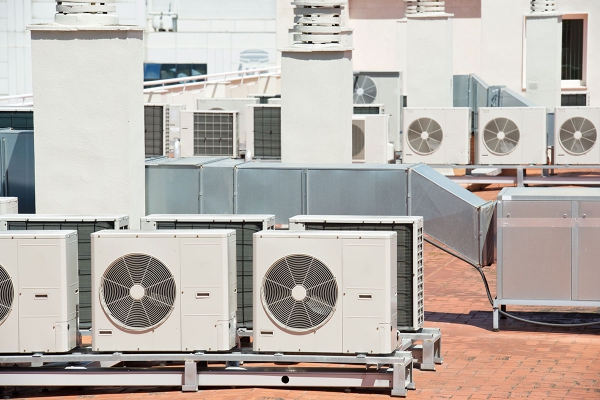 47058567viewontheroofofabuildingofalargeairconditioningequipment.jpg